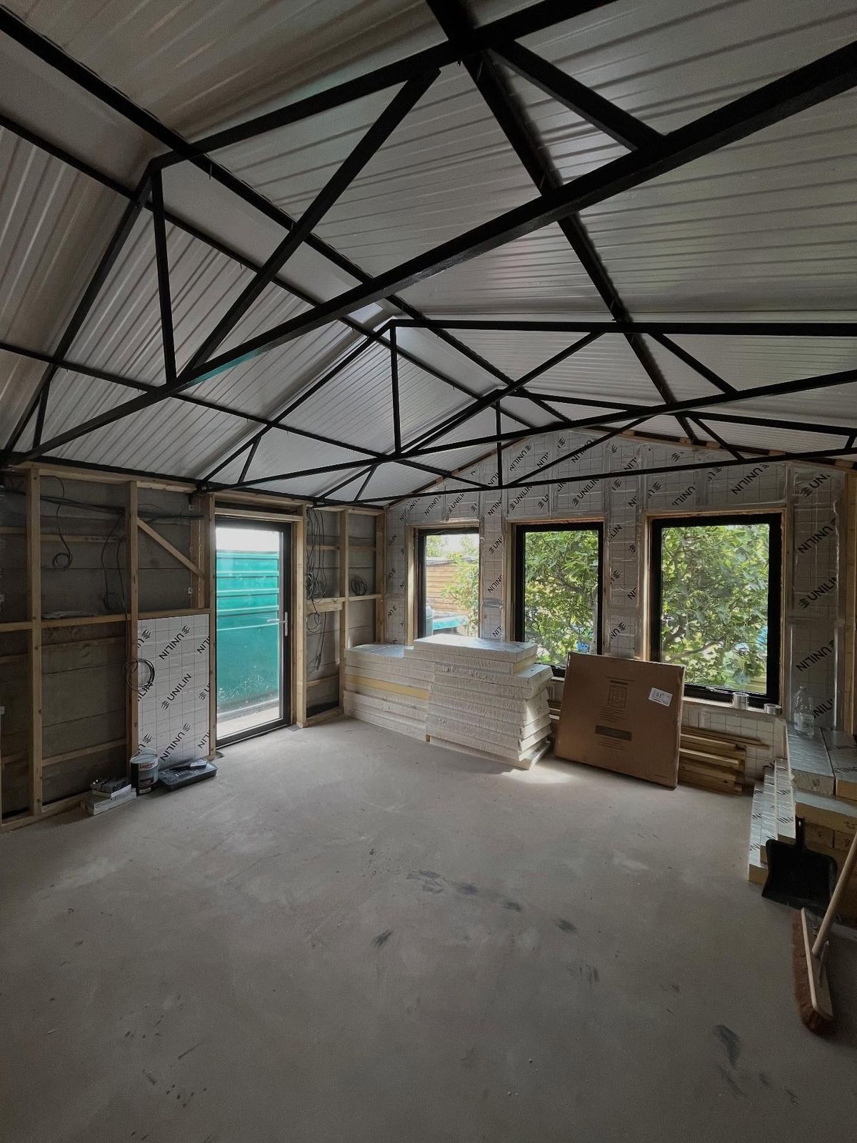 Steel roof frame inside the converted garage