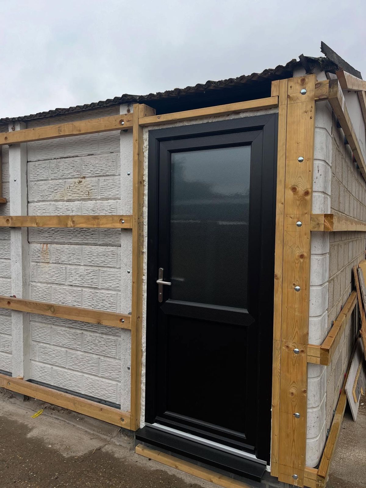 New door fitted into the old block wall
