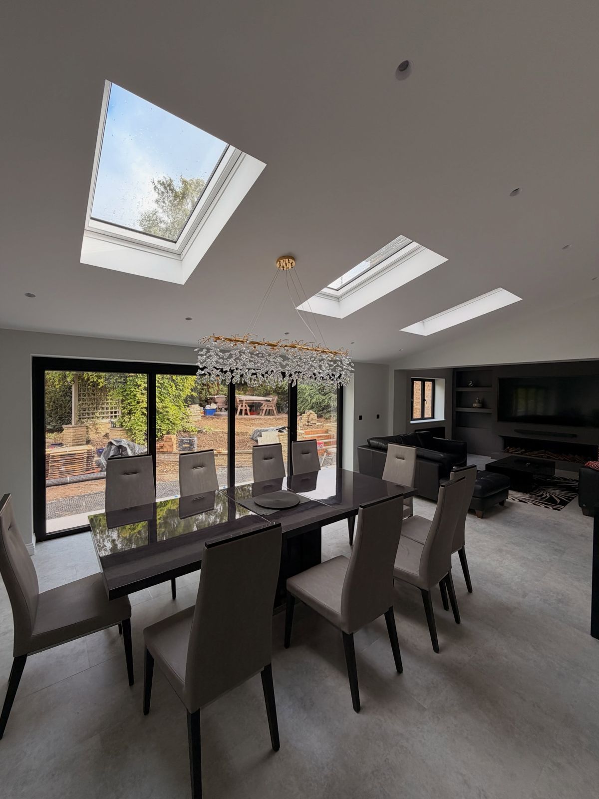 Dining area with rooflights and crystal chandelier in the Gillingham extension